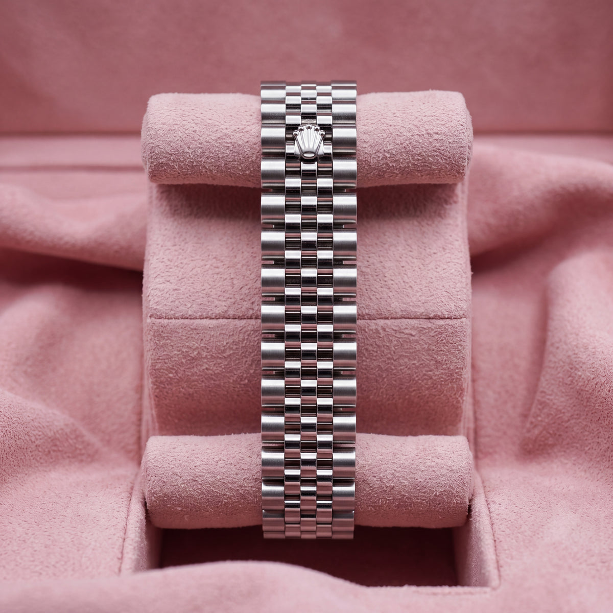 Jubilee bracelet with crown clasp on pink cushion; confirm image belongs to this watch