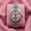 Front view of pink-dial Datejust 31 with Roman-numeral markers, fluted bezel and Jubilee bracelet