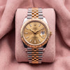 Rolex Datejust 41 126333 with champagne dial, yellow gold fluted bezel and steel and yellow gold Jubilee bracelet