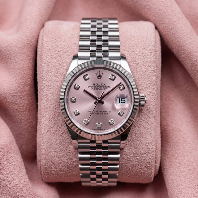 Rolex Datejust 31 278274 with pink diamond dot dial, white gold fluted bezel and stainless steel Jubilee bracelet