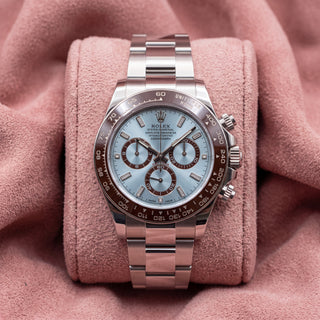 2023 platinum Rolex Daytona 126506 with ice-blue dial, baguette markers and brown ceramic bezel