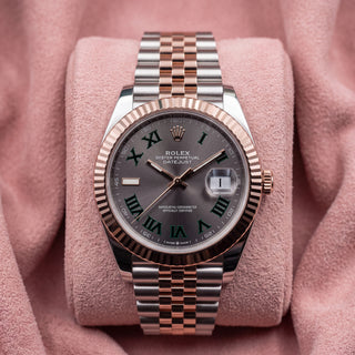 Rolex Datejust Wimbledon with grey dial, green-outlined Roman numerals, rose-gold fluted bezel and two-tone Jubilee bracelet